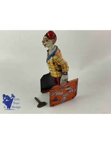 DISTLER ALLEMAGNE CLOWN AVEC VALISES MECANIQUE VERS 1920 Venez découvrir notre 